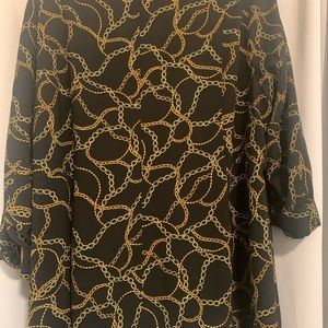 Torrid, 2 piece set that comes with a belt( can come off) black and gold sz 2